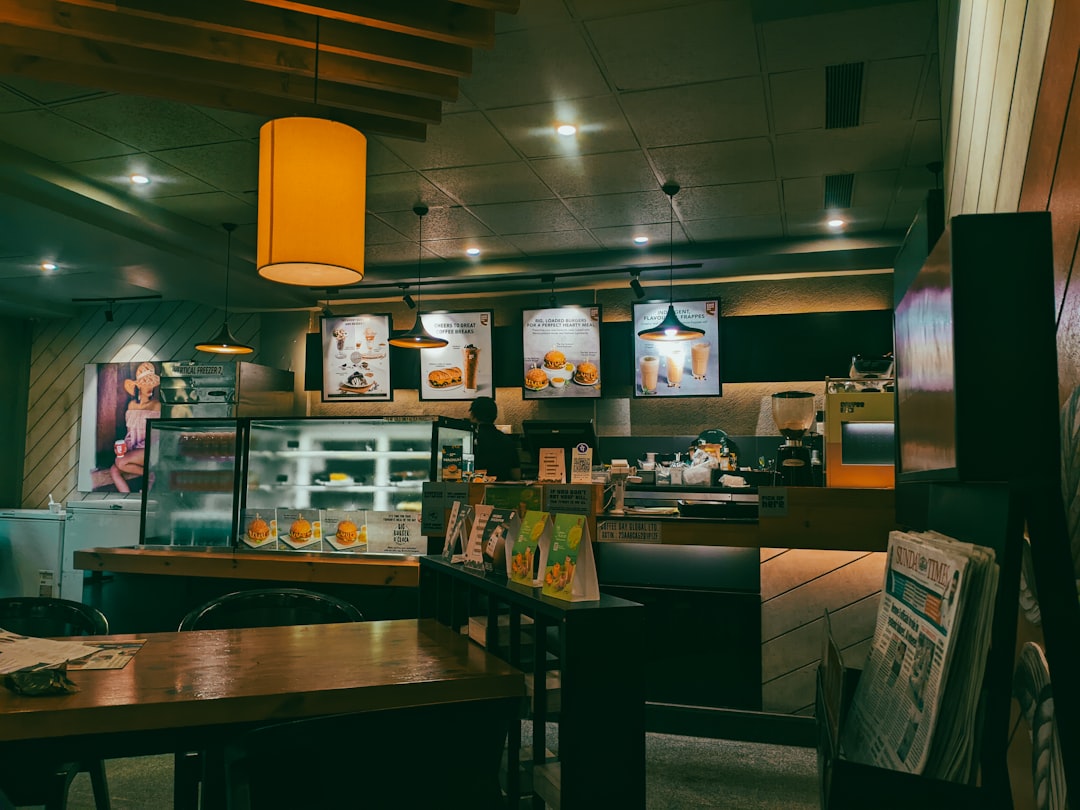A coffee shop interior with warm lighting